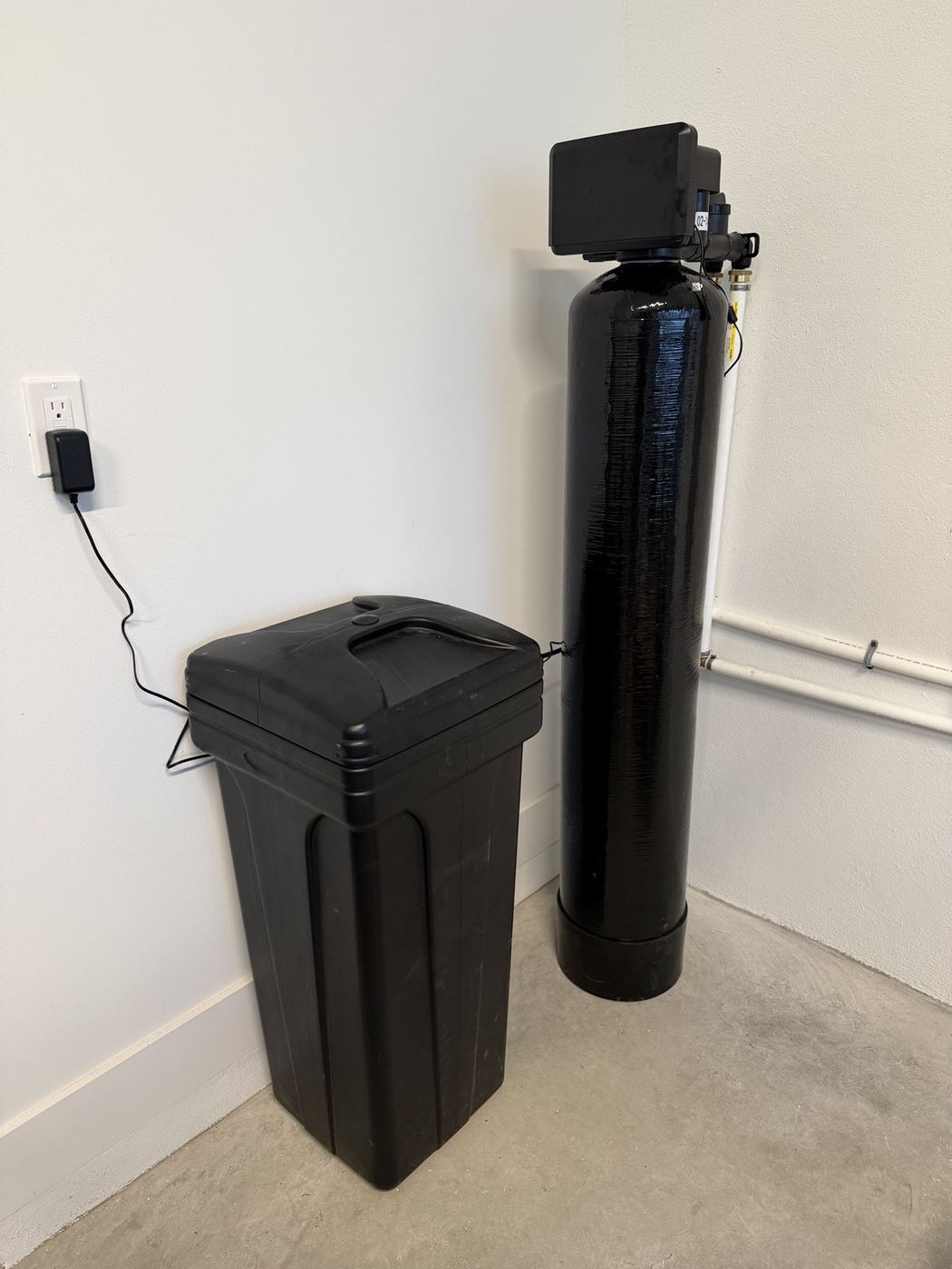Airgead whole-home filtration and softener system installed in a South Florida garage